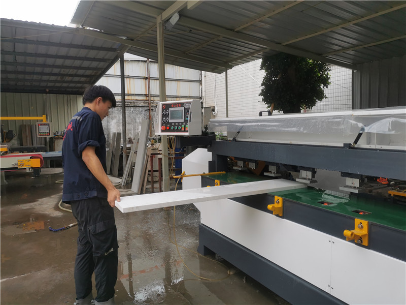 A chamfering cutting machine for sintered stone and porcelain slab